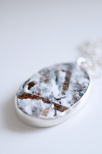 Penjoll de plata amb Astrofil·lita natural.