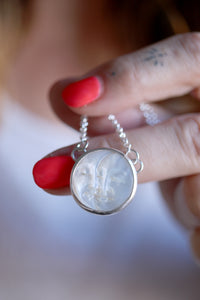 Penjoll de plata amb Lluna de dos fases de Nacre.