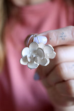 Arracades Orquídia de plata.