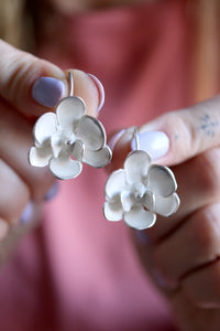 Arracades Orquídia de plata.