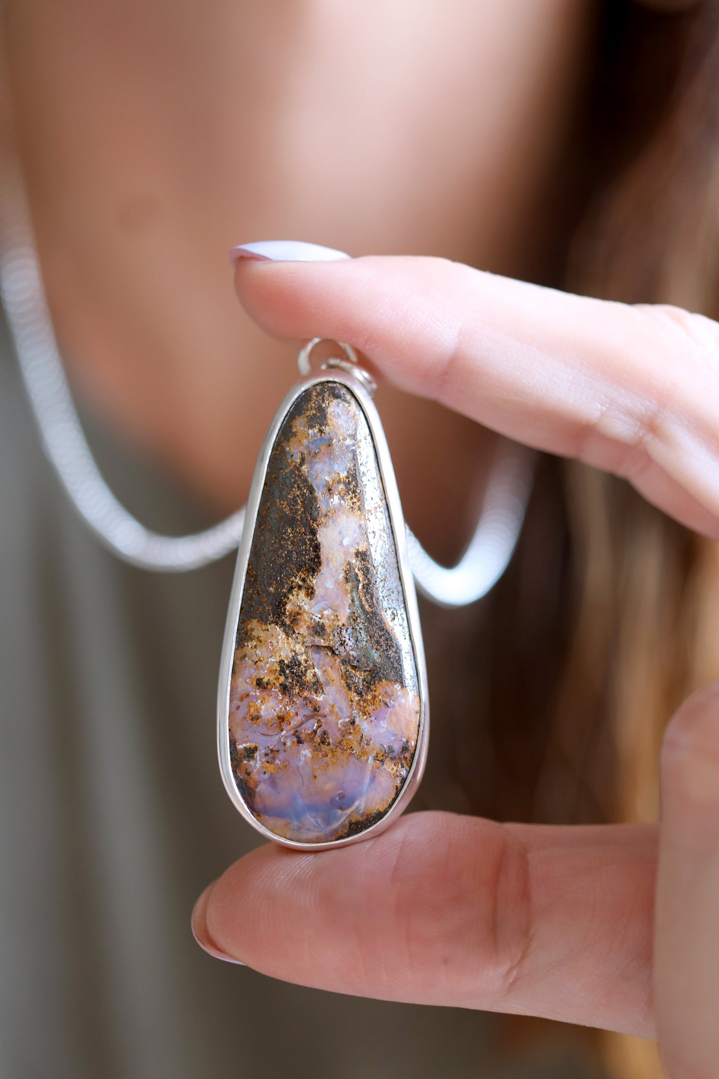 Penjoll de plata amb Òpal Boulder.