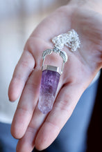 Penjoll de plata amb cristall d'Ametista.