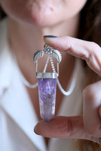 Penjoll de plata amb cristall d'Ametista.