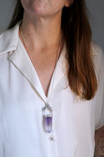 Penjoll de plata amb cristall d'Ametista.