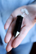 Penjoll de plata amb cristall d'Obsidiana.