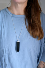 Penjoll de plata amb cristall d'Obsidiana.