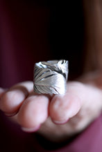 Anell de ploma de plata.