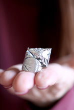 Anell de ploma de plata.