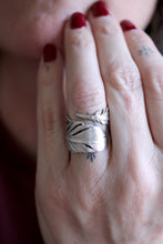 Anell de ploma de plata.