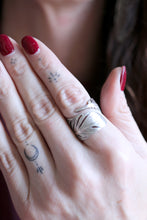 Anell de ploma de plata.