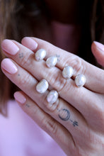 Arracades de botó de Perles.