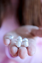 Arracades de botó de Perles.