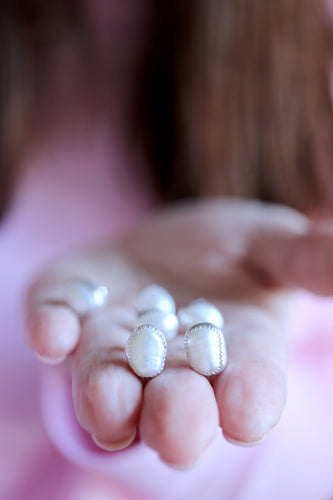 Arracades de botó de Perles.