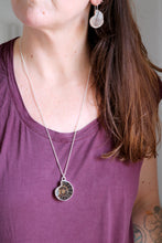 Penjoll de plata amb Ammonit.