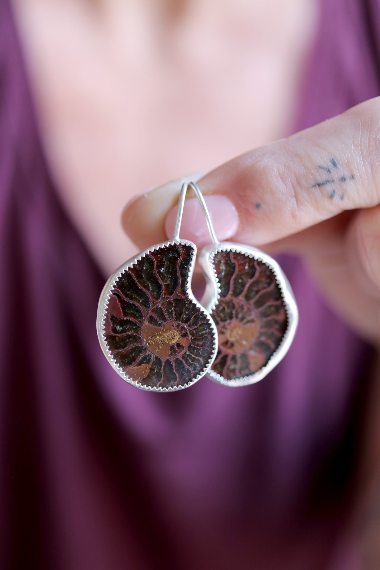 Arracades de plata amb Ammonit.