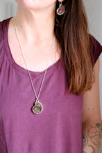 Penjoll de plata amb Ammonit.