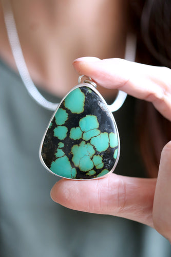 Penjoll de plata amb Turquesa natural.