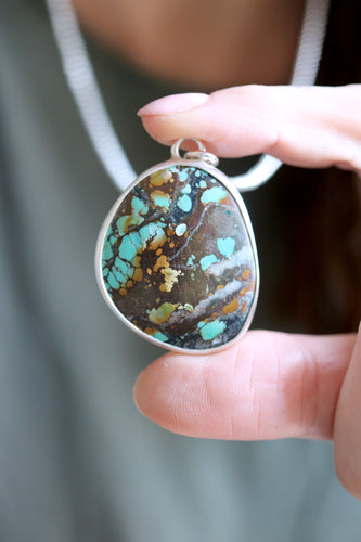 Penjoll de plata amb Turquesa natural.