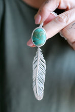 Penjoll de ploma amb Turquesa natural.