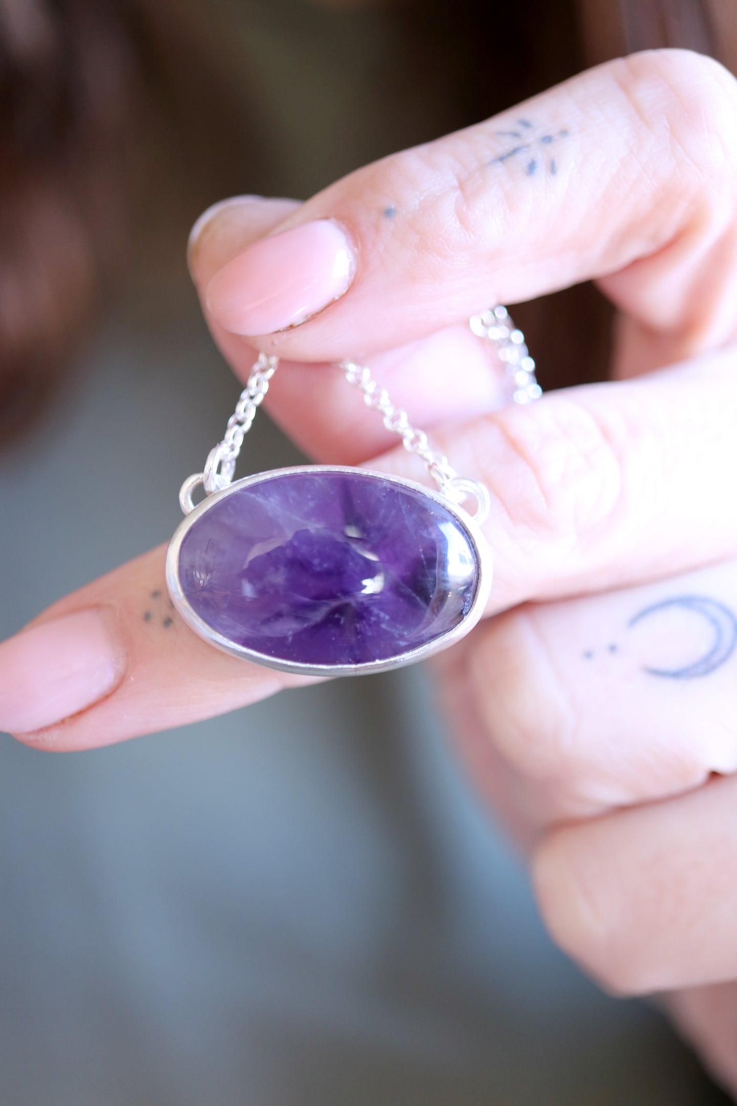 Penjoll de plata amb Ametista natural.