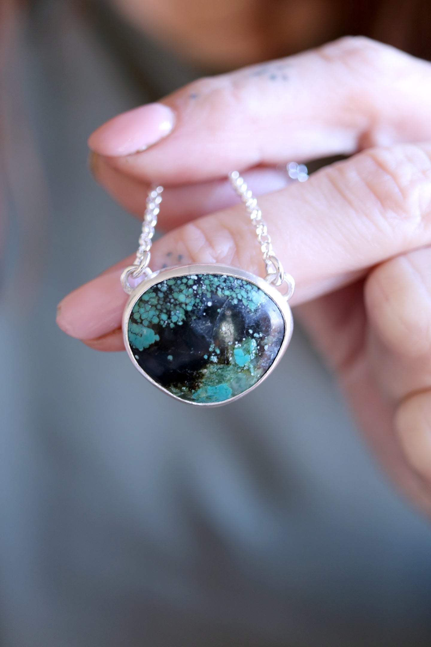 Penjoll de plata amb Turquesa natural.