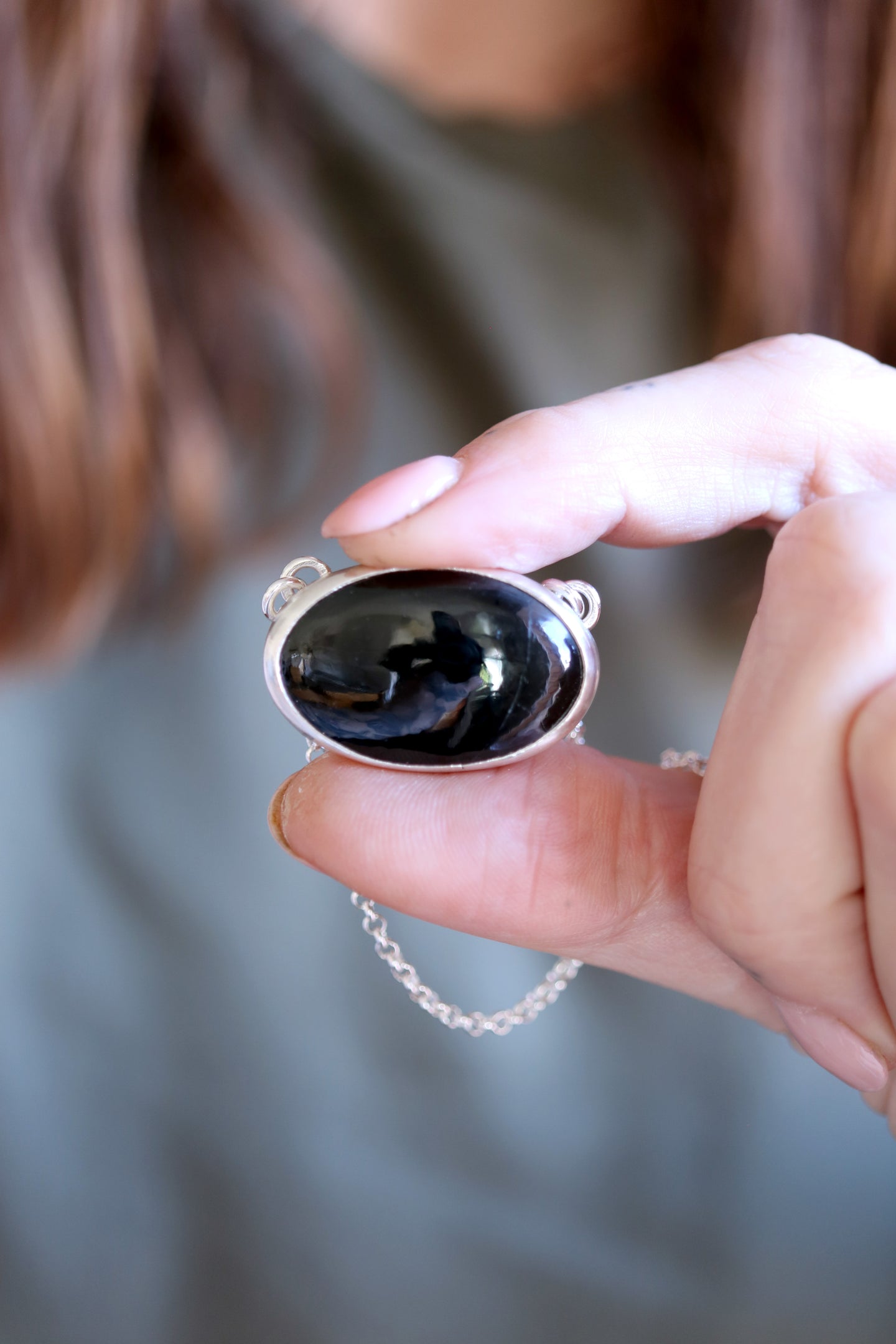 Penjoll de plata amb Turmalina negra.