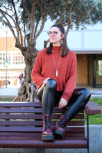 Penjoll de ploma de plata.