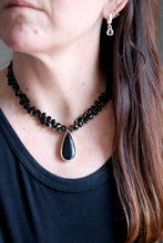 Arracades de plata i Espinel·la negra.