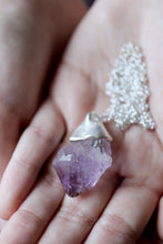 Penjoll de plata amb punta d'Ametista.