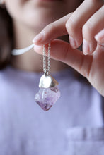 Penjoll de plata amb punta d'Ametista.