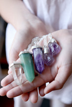 Penjoll de plata amb punta d'Ametista.