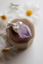 Penjoll de plata amb punta d'Ametista.