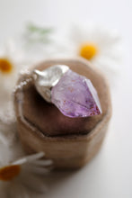 Penjoll de plata amb punta d'Ametista.