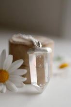 Penjoll de plata amb cristall de Quars natural.