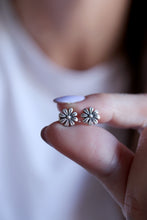 Arracades flors de plata.