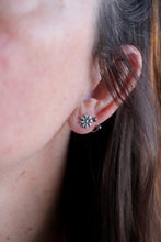 Arracades flors de plata.