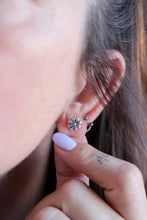 Arracades flors de plata.