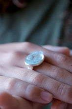 Anell de plata amb Aiguamarina natural.