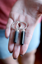 Arracades de plata amb Turmalina negra.