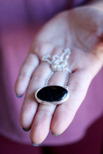 Penjoll de plata amb Turmalina negra.