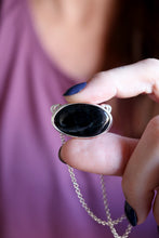 Penjoll de plata amb Turmalina negra.