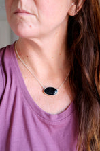Penjoll de plata amb Turmalina negra.