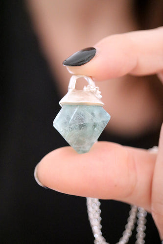 Penjoll de plata amb cristall de Fluorita.