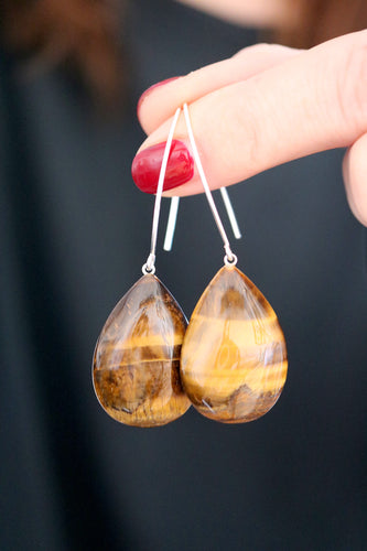 Arracades de plata amb llàgrimes d'Ull de Tigre.